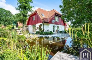 Haus kaufen in 24229 Strande, Architektonisch anspruchsvolles Wohnkonzept mit Gartenparadies und unmittelbarer Waldrandlage