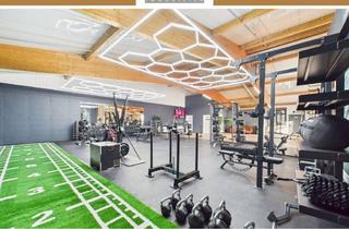 Gewerbeimmobilie kaufen in 84061 Ergoldsbach, Ertragsstarkes Gesamtpaket: Vermietete Gewerbehalle an modernes Fitnessstudio inkl. EFH (Altbestand)