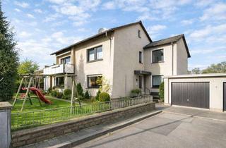 Haus kaufen in 58119 Hohenlimburg, Freistehendes Zweifamilienhaus mit großer Garage und schönem Grundstück in Hohenlim