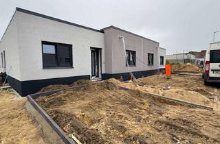 Haus mieten in Wilhelm-Herz-Straße 22, 19322 Wittenberge, Neubau-Doppelbungalow in Wittenberge – Wohnen nahe der Elbuferpromenade Lage: