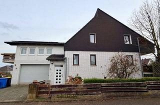 Haus kaufen in 34355 Staufenberg, !PROVISIONSFREI! Schönes Haus in Staufenberg-Landwehrhagen (262 m² Wfl./125 m² Nfl.) ++Einliegerwohnung, 3 Balkone, 2 Photovoltaik-Anlagen, Solarwärmepumpe, Kamin, Doppelgarage++ Monatsrate 1.444,20 €