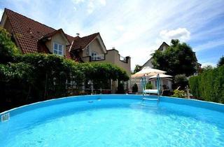 Haus kaufen in 63762 Großostheim, Großostheim - Wunderschönes EFH mit ELW in ruhiger Lage von Großostheim