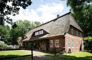 Haus kaufen in 29640 Schneverdingen, Schneverdingen - Idyllischer Reetdachreiterhof mit Gästezimmern und Apartments