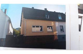 Doppelhaushälfte kaufen in 35428 Langgöns, Langgöns - Zweifamilienhaus in Langgöns zu Verkaufen