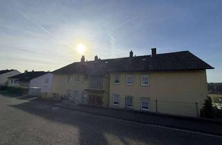 Wohnung kaufen in 97837 Erlenbach, Stilvolle Eigentumswohnung mit Weitblick über Erlenbach