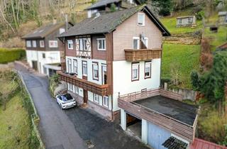 Mehrfamilienhaus kaufen in 75323 Bad Wildbad, Großes Mehrfamilienhaus mit zwei Balkonen und zwei Garagen