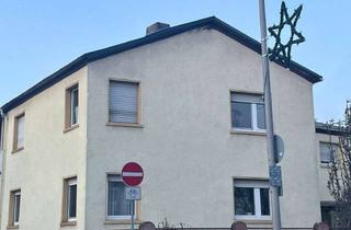 Haus kaufen in 65795 Hattersheim, Zweifamilienhaus zur Kernsanierung mit Ausbaureserve in Hattersheim