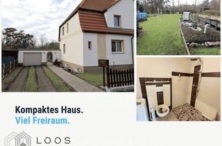 Doppelhaushälfte kaufen in 03238 Sallgast, Kompaktes Haus am Wald: DHH mit Garten und Nebengebäuden