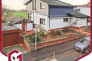 Einfamilienhaus kaufen in 53332 Bornheim, Viele Möglichkeiten! Großzügiges Split-Level-Einfamilienhaus mit großem Garten und Garage in Brenig