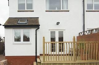 Einfamilienhaus kaufen in 41239 Mönchengladbach, Reihenmittelhaus mit Flügelanbau