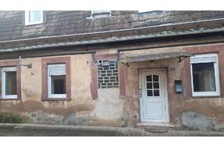 Reihenhaus kaufen in 37671 Höxter, Höxter - Renovierungsbeduerftiges Reihenhaus