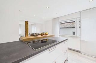 Wohnung kaufen in 71277 Rutesheim, Raum zum Wohlfühlen - Modernisierte 2,5-Zimmer-Wohnung mit Terrasse & Stellplatz