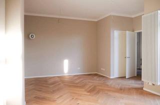 Wohnung kaufen in 76133 Südweststadt, Zeitlose Eleganz: Hochwertig sanierte Altbauwohnung