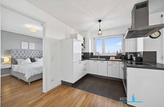 Wohnung kaufen in Freisinger Str., 85716 Unterschleißheim, Helle 2-Zimmer-Wohnung mit Balkon & Duplex-Garage in Unterschleißheim