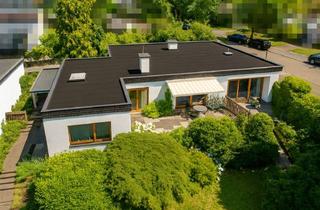 Haus kaufen in 51375 Schlebusch, Auf einer Ebene wohnen: Großzügiger Bungalow in ruhiger, begehrter Lage von Schlebusch!