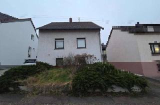 Einfamilienhaus kaufen in 66787 Wadgassen, Freistehendes Einfamilienhaus mit Garage und Renovierungsbedarf in Wadgassen-Differten