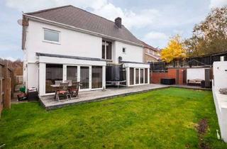 Haus kaufen in 65199 Dotzheim, Modernes Stadthaus mit Wintergarten, Terrasse & Garage in ruhiger Lage von Wiesbaden-Dotzheim