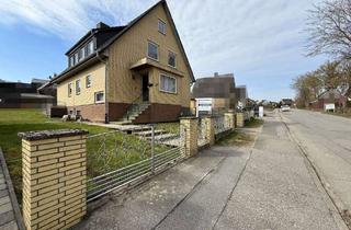 Haus kaufen in 23619 Zarpen, Zarpen : Zweifamilienhaus mit Garage, Vollkeller und Ausbaureserve im Ortskern