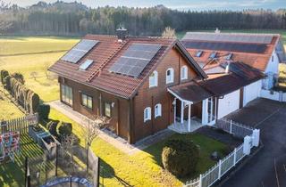 Haus kaufen in 86949 Windach, Baubiologisches Blockbohlen-Massivhaus mit neuer PV-Anlage in wunderbarer Ortsrandlage.