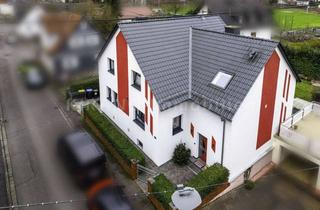 Haus kaufen in 63695 Glauburg, Energieeffizient saniertes Zweifamilienhaus mit Büro und gepflegtem Garten in Glauburg