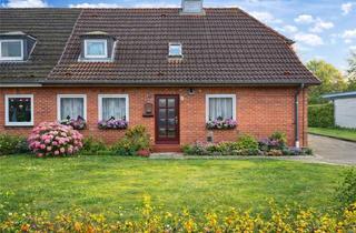 Doppelhaushälfte kaufen in 24576 Bad Bramstedt, Charmante Doppelhaushälfte mit Wintergarten in ruhiger Lage