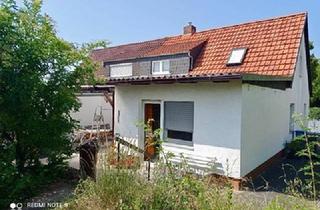 Haus kaufen in 97424 Schweinfurt, DHH mit Garage auf großem Grundstück in der Gartenstadt zu verkaufen