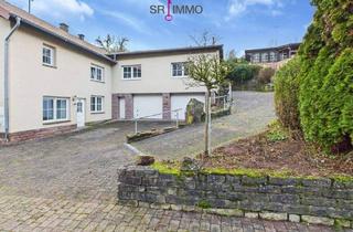 Einfamilienhaus kaufen in 54636 Baustert, Baustert - Wohnen mit Perspektive: Haus mit zwei Wohnungen und Baugrundstück in Baustert