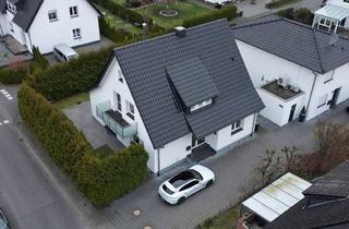 Einfamilienhaus kaufen in Tulpenweg 16, 33330 Gütersloh, Gütersloh - Neubau-Feeling - kernsaniertes Einfamilienhaus mit Wärmepumpe