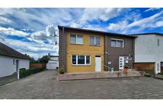 Haus kaufen in 38468 Ehra-Lessien, Gemütliches Zuhause mit Praxisräumen und eigenem Garten.