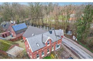 Doppelhaushälfte kaufen in 26553 Dornum, Dornum - Mehrfamilienhaus - 4 Parteien in Dornum am Wasserschloss