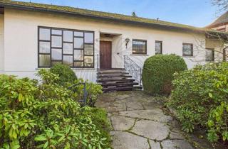 Haus kaufen in 61250 Usingen, Ein Zuhause mit Entwicklungsmöglichkeit und separatem Grundstück!