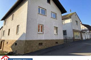 Haus kaufen in 35469 Allendorf, Das Rendite-Paket in Allendorf: 2 Häuser, 5 Garagen und riesiges Potenzial