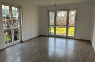 Wohnung kaufen in 85238 Petershausen, Petershausen - 2,5-Zimmer-Erdgeschosswohnung mit Garten & Tiefgarage in