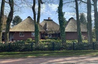 Villa kaufen in 26169 Friesoythe, Friesoythe - Modernisierte Reethaus Villa mit parkähnlichem Grundstück