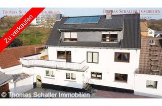 Haus kaufen in 63694 Limeshain, Zweifamilienhaus mit Nebengebäude, 2 Garagen und modernisierter Ausstattung