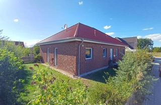 Haus kaufen in 23684 Scharbeutz, Neuwertiger Bungalow mit wunderschönem Garten in Scharbeutz OT Gleschendorf