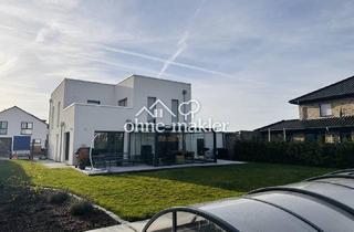 Villa kaufen in 31246 Ilsede, Exklusiv wohnen - moderne Stadtvilla mit Pool und Stil