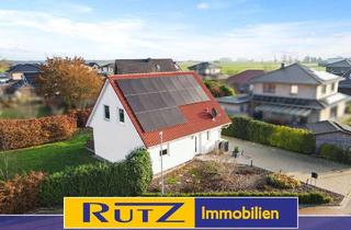 Einfamilienhaus kaufen in 27804 Berne, Berne | Modernisiertes Einfamilienhaus mit Wärmepumpe und PV-Anlage in ruhiger Wohnsiedlung