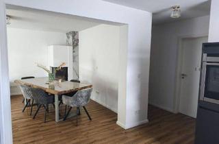 Wohnung kaufen in 40724 Hilden, HIlden - Lichtdurchflutete Wohnung mit Garage, Kamin und eigenem Garten im freistehendem Haus