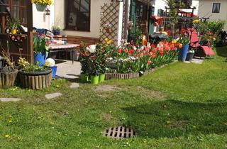 Wohnung kaufen in 83471 Berchtesgaden, Helle 4-Zimmer-Erdgeschosswohnung mit zwei Terrassen und Gartenanteil in ruhiger Lage