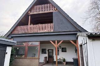 Haus kaufen in 28790 Schwanewede, Zweifamilienhaus in ruhiger und dennoch zentraler Lage von Schwanewede im Ortsteil Neuenkirchen