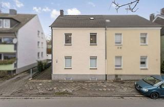 Doppelhaushälfte kaufen in 44579 Castrop-Rauxel, Doppelhaushälfte mit Entwicklungspotenzial und Doppelgarage sowie kleinem Garten.