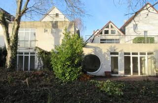 Haus kaufen in 64354 Reinheim, Haus mit unkonventionellen Anbauten