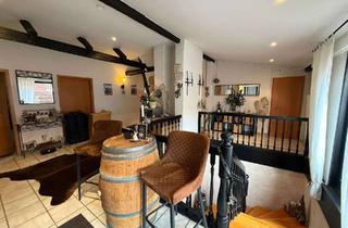 Wohnung kaufen in 31535 Neustadt, Helle 3–4-Zimmer-Wohnung mit großer Dachterrasse, Kamin, Sauna und Garage in Neustadt am Rübenberge