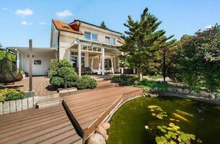 Haus kaufen in 15738 Zeuthen, Zeuthen - Wohntraum mit Energieeffizienzklasse A trifft Idylle mit unverbautem Weitblick