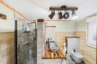 Einfamilienhaus kaufen in 66589 Merchweiler, Einfamilienhaus in Merchweiler - modernisiert 2024, 102 m² Wohnfläche und großer Garten!