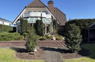 Haus kaufen in 32584 Löhne, Geschmackvolles 1-2-Familienhaus mit Wintergarten und Gartenidylle