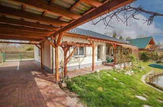 Einfamilienhaus kaufen in 14669 Ketzin, Ketzin - Wasserlage mit Seltenheitswert - stilvoller Bungalow mit eigenem Wasserzugang & Anlegestelle