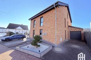 Wohnung kaufen in 34225 Baunatal, Exklusive 3-Zi Maisonette-Whg (EG & UG) in Effizienzhaus in sehr ruhiger Lage mit Garten in Baunatal