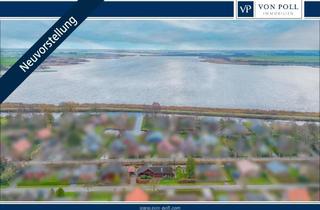 Immobilie kaufen in 26624 Südbrookmerland, Seltene Gelegenheit - Doppelgrundstück mit Bootssteg und Altbestand am großen Meer